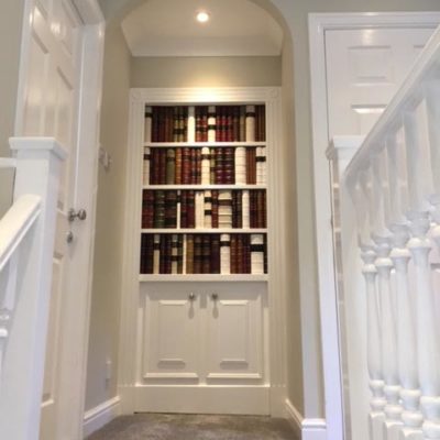 Secret bookcase door private client